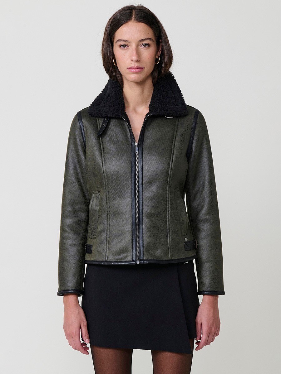 Women’s double-sided jacket, faux leather exterior, faux fur interior, metallic zipper and side buckles in khaki.