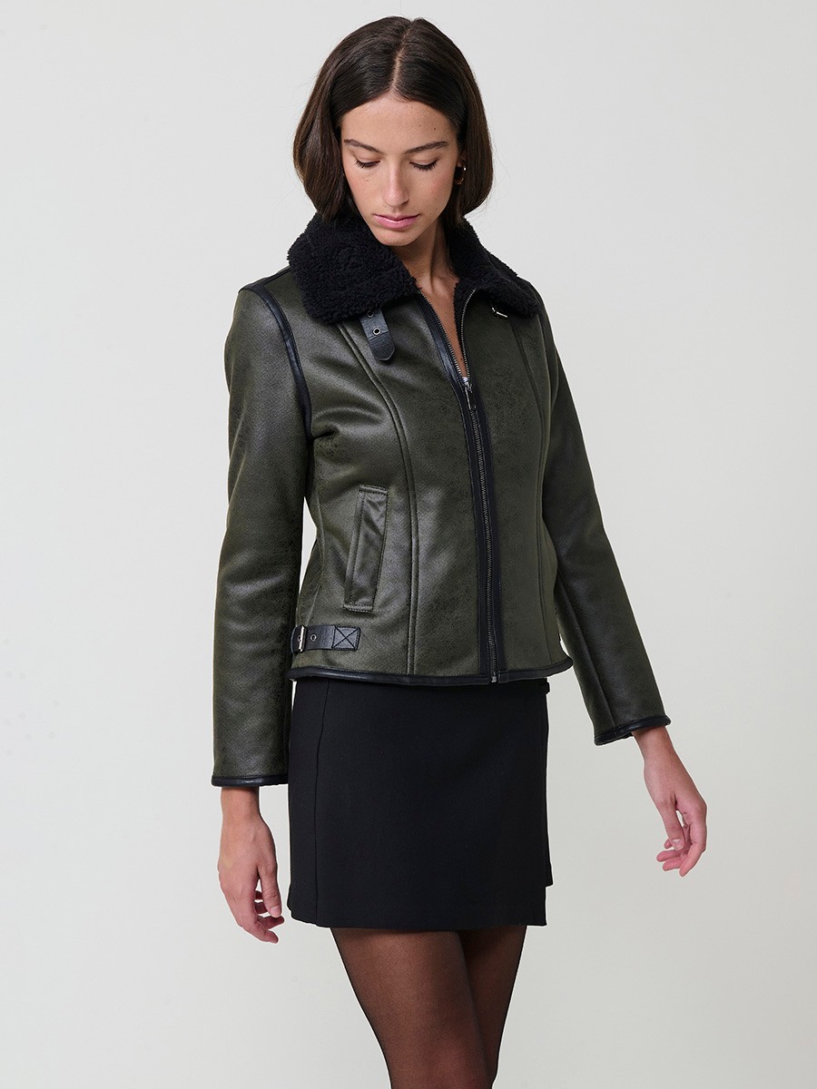 Women’s double-sided jacket, faux leather exterior, faux fur interior, metallic zipper and side buckles in khaki.