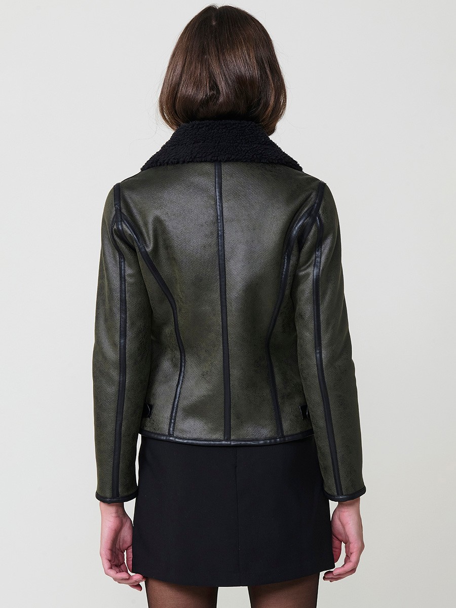 Women’s double-sided jacket, faux leather exterior, faux fur interior, metallic zipper and side buckles in khaki.