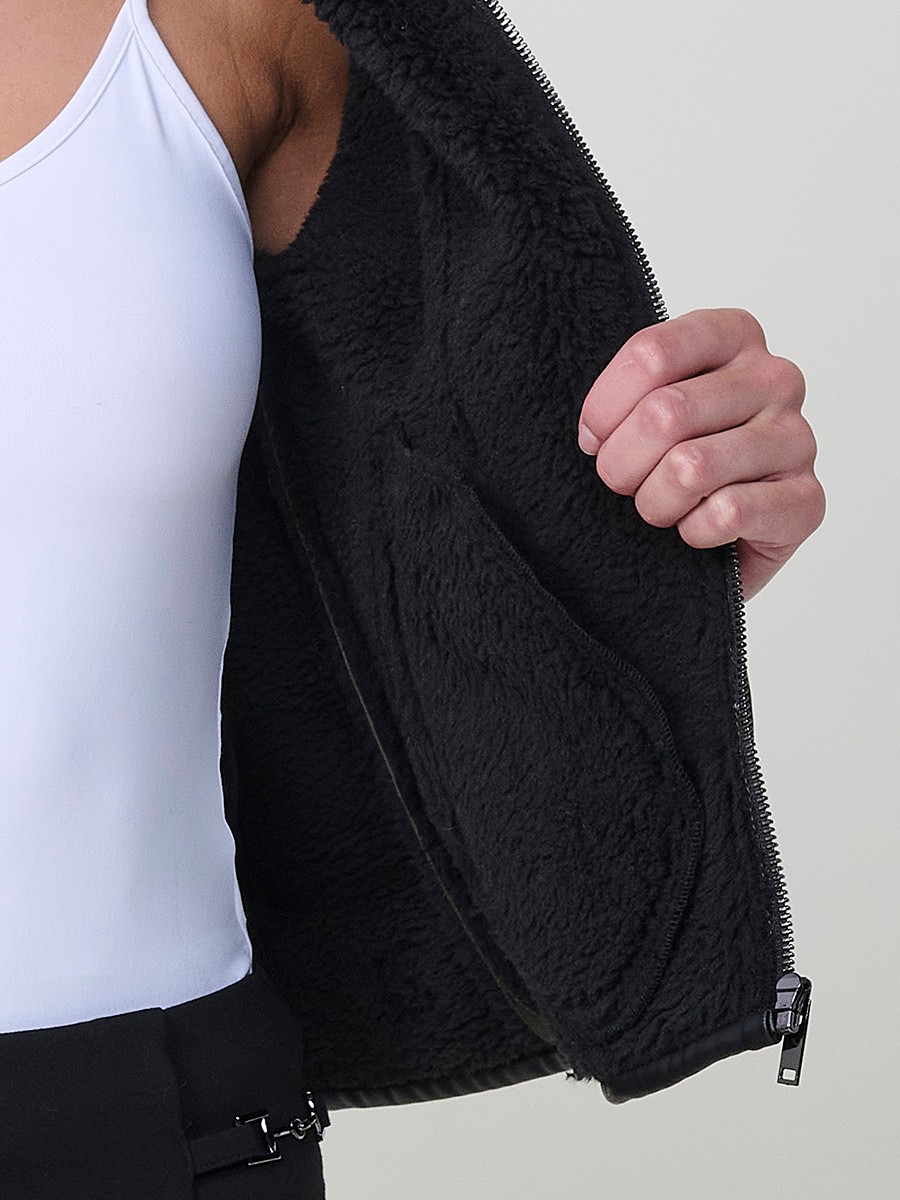 Women’s double-sided jacket, faux leather exterior, faux fur interior, metallic zipper and side buckles in khaki.