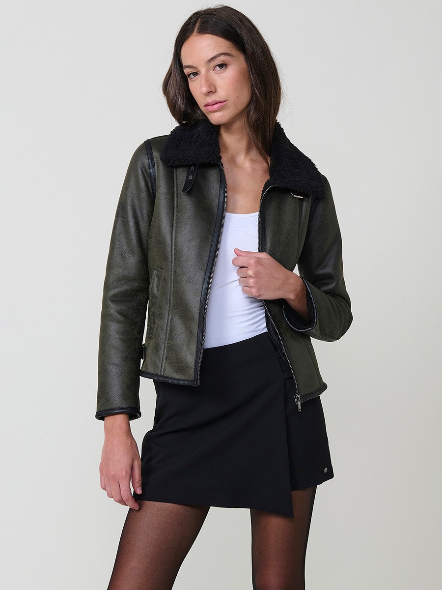 Women’s double-sided jacket, faux leather exterior, faux fur interior, metallic zipper and side buckles in khaki.