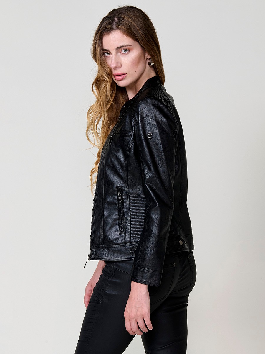 Women’s biker jacket in black faux leather, mao collar, metallic zippers, decorative pockets and quilted stitching details.