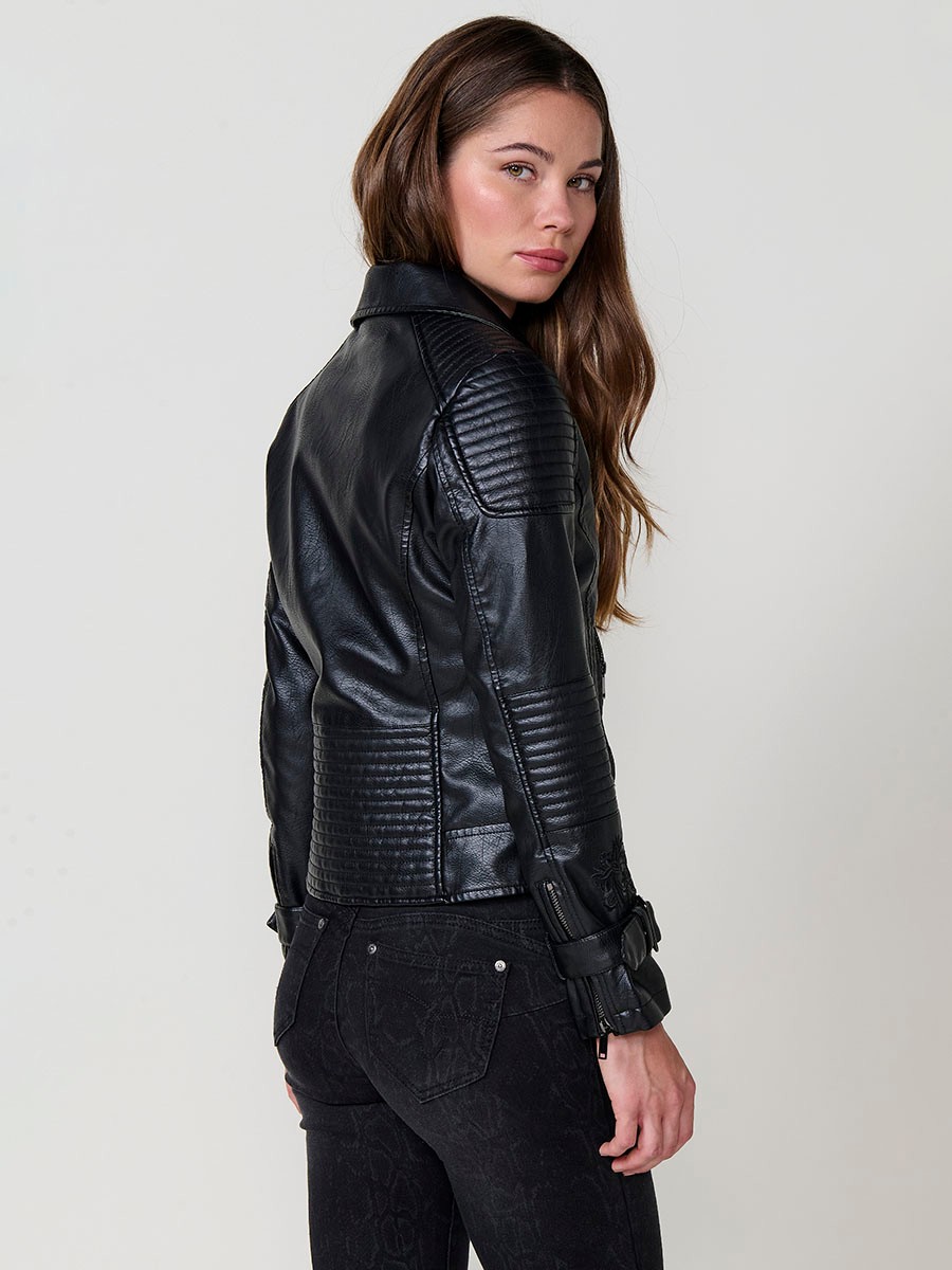 Women’s biker jacket in black faux leather, mao collar, metallic zipper closure and decorative chest pockets.
