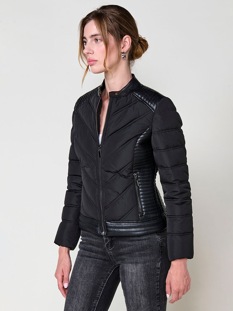 Women’s quilted faux leather biker jacket in black with mao collar, metallic zippers and stitched shoulder details.