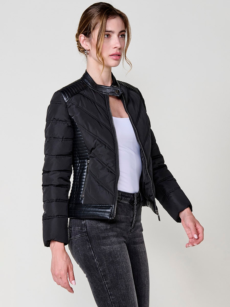 Women’s quilted faux leather biker jacket in black with mao collar, metallic zippers and stitched shoulder details.