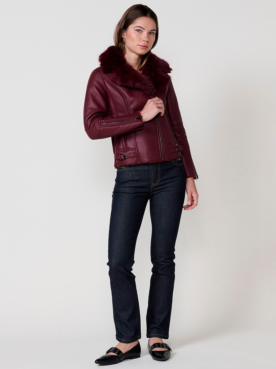Women’s burgundy crossover jacket with detachable faux fur collar, versatile and elegant, made from 100% polyester.