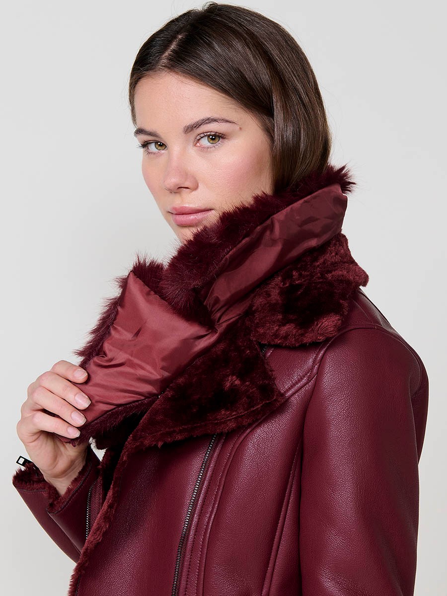 Women’s burgundy crossover jacket with detachable faux fur collar, versatile and elegant, made from 100% polyester.