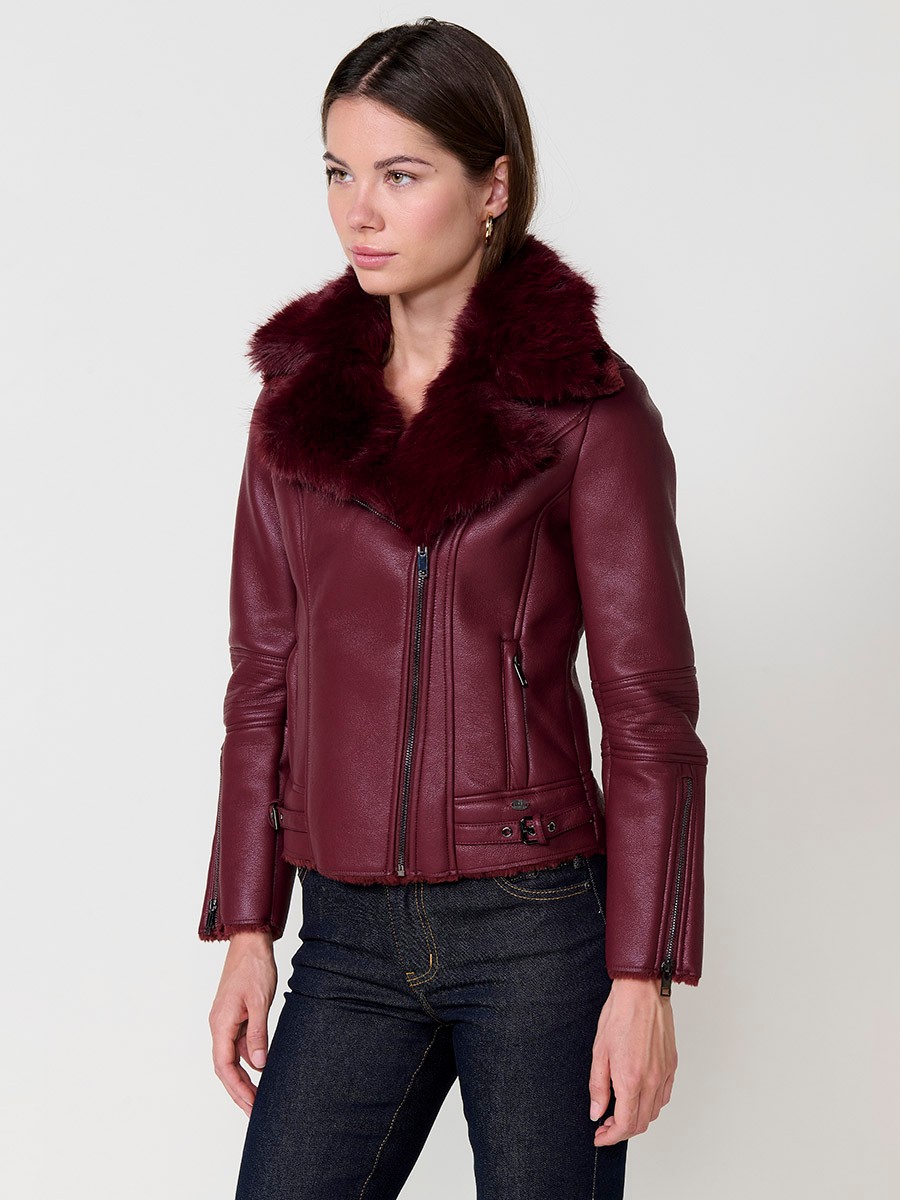 Women’s burgundy crossover jacket with detachable faux fur collar, versatile and elegant, made from 100% polyester.