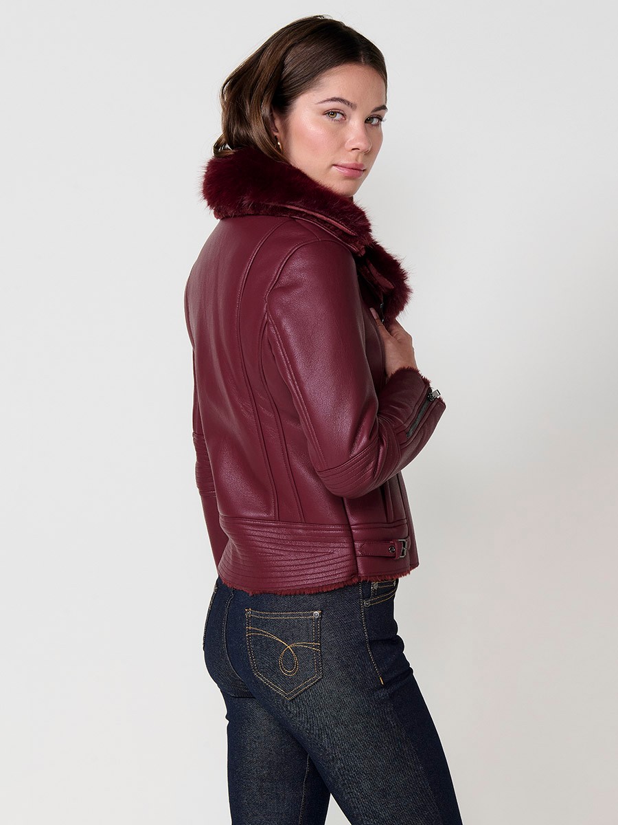 Women’s burgundy crossover jacket with detachable faux fur collar, versatile and elegant, made from 100% polyester.