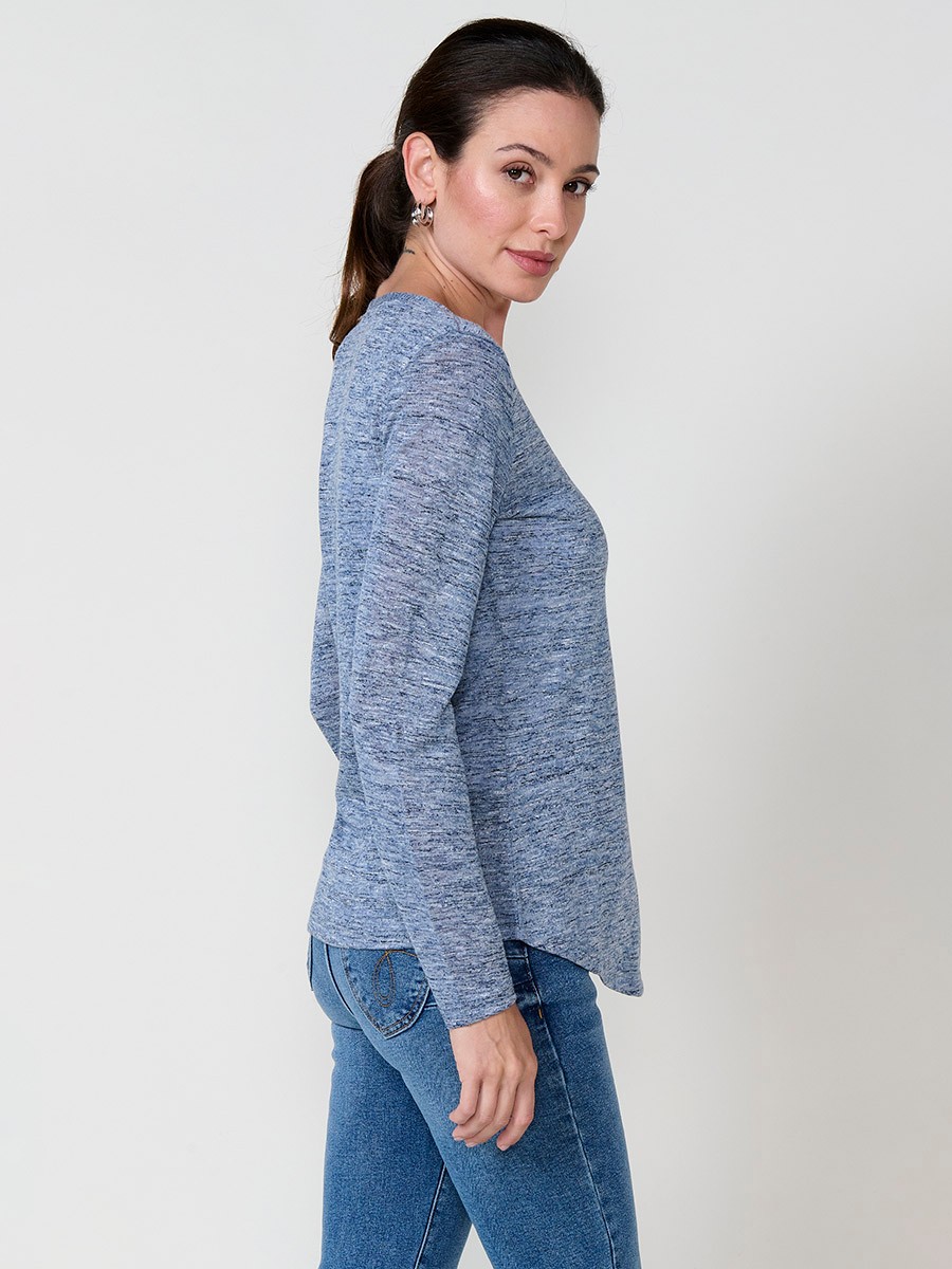 Navy women’s T-shirt in flame fabric with asymmetric hem, diagonal buttons and shiny embroidery.