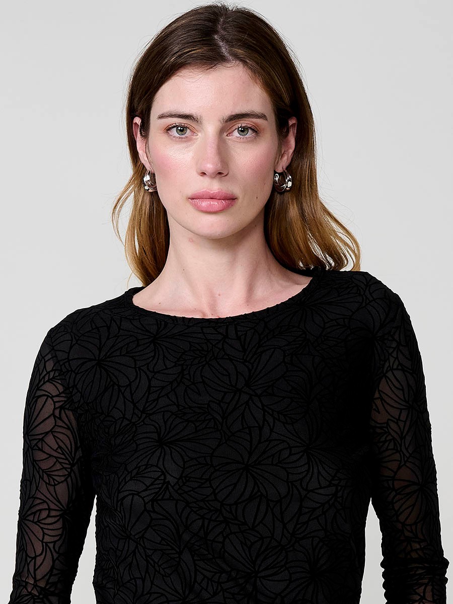 Women’s semi-sheer stretch mesh top with floral velvet-effect print and body lining.