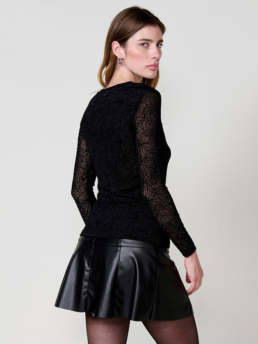 Women’s semi-sheer stretch mesh top with floral velvet-effect print and body lining.