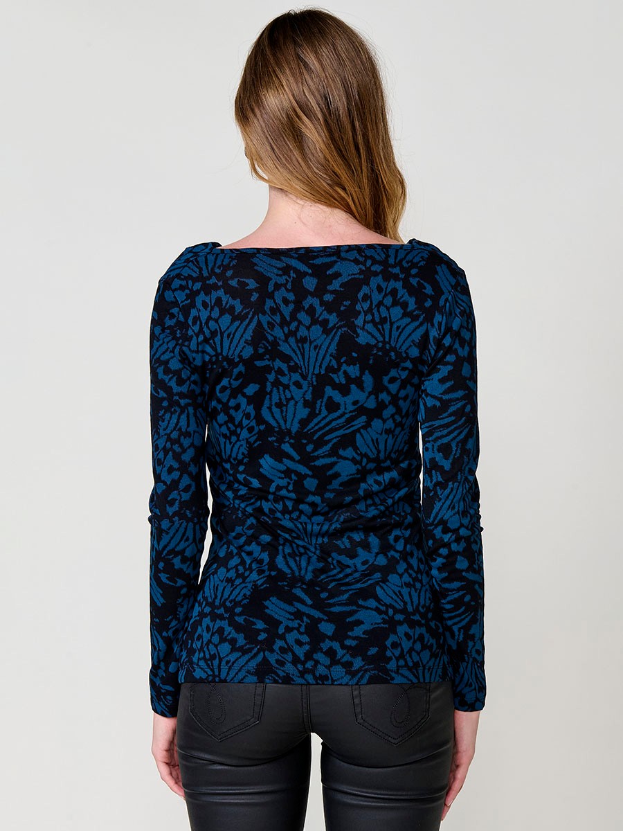 Women's navy long sleeve top with draped neckline and studs 3