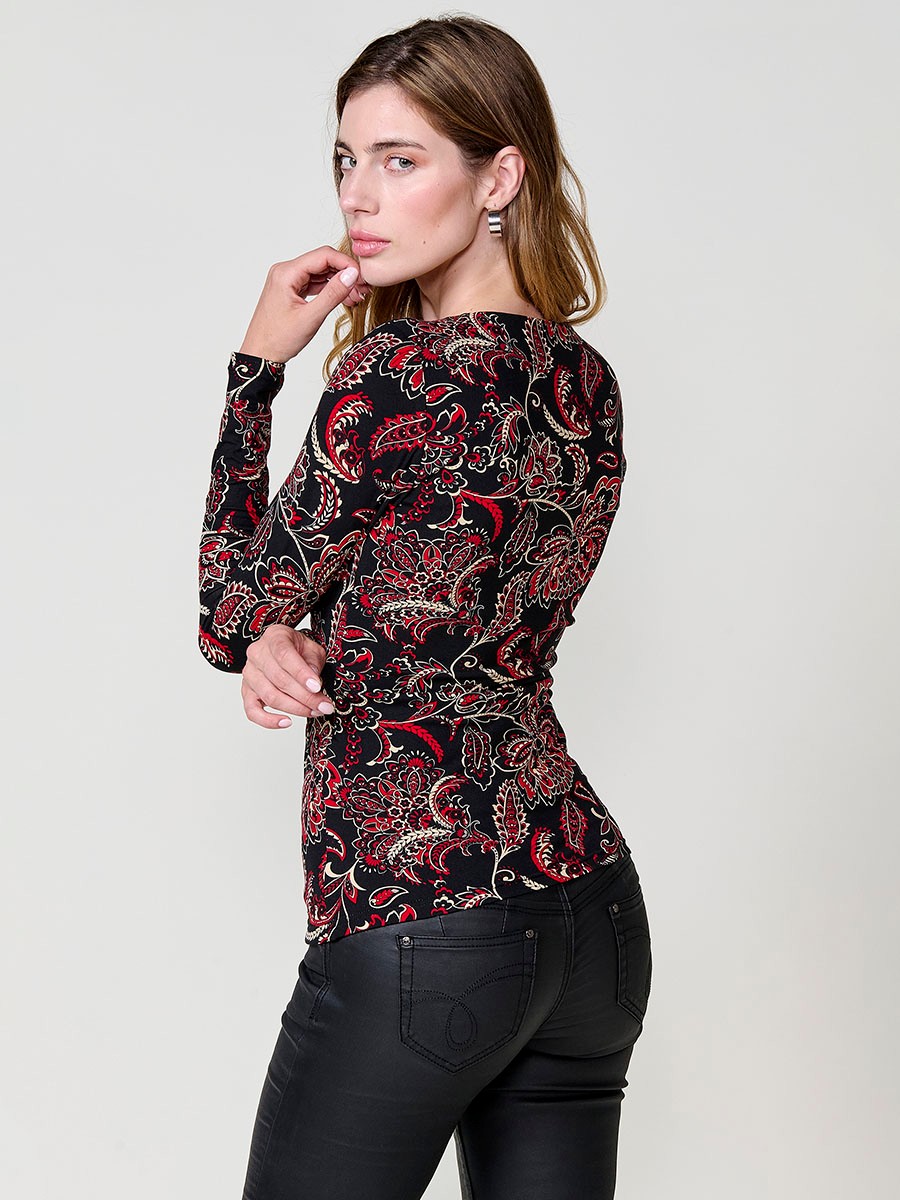 Women’s long sleeve top with paisley print, wrap neckline and ruched front. Metallic Koröshi logo plate.