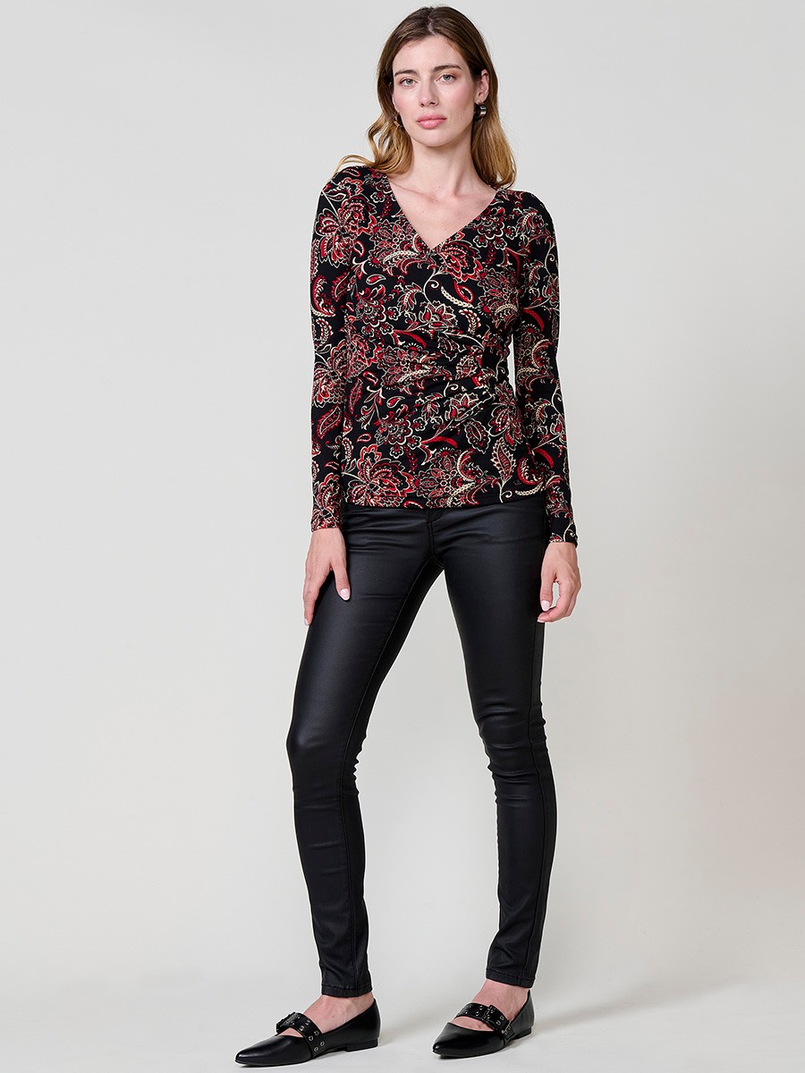 Women’s long sleeve top with paisley print, wrap neckline and ruched front. Metallic Koröshi logo plate.