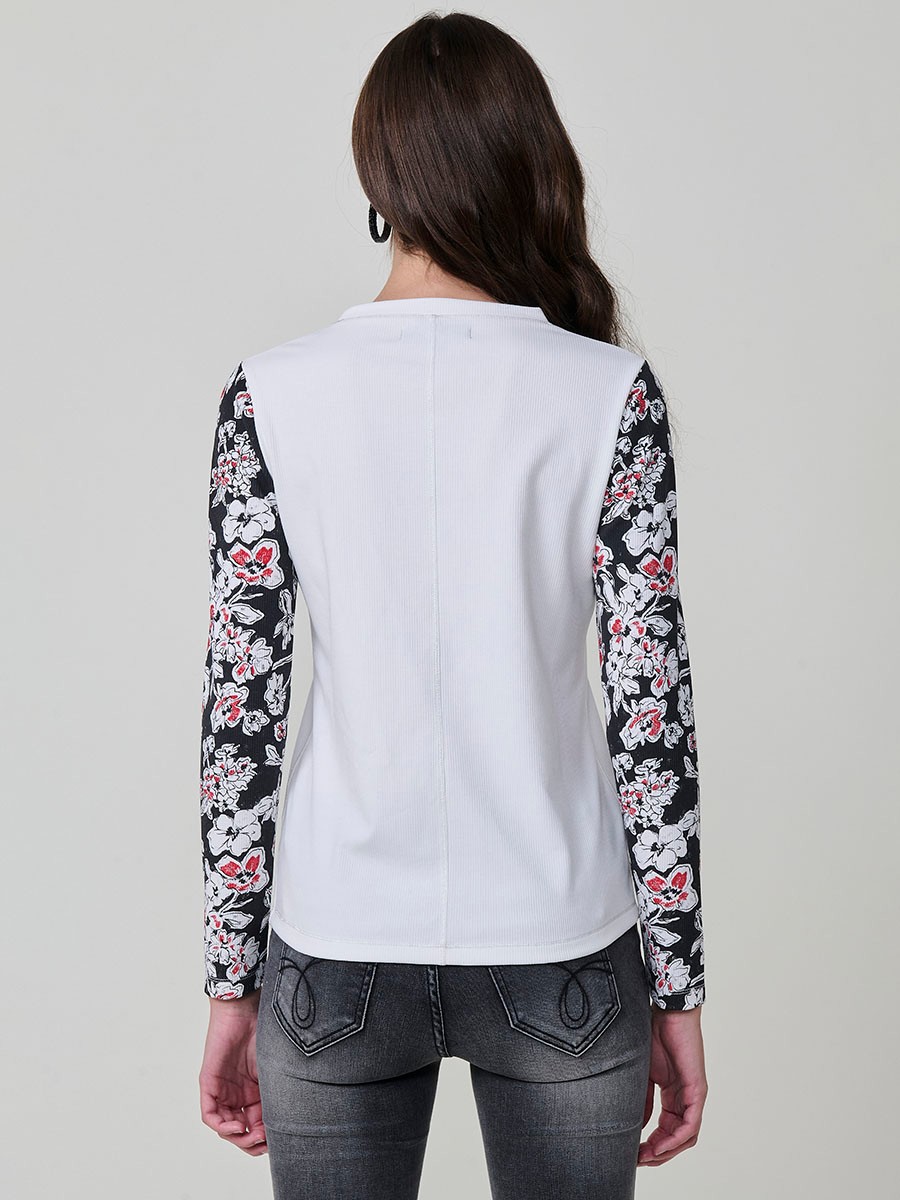 Women’s long sleeve ribbed top with girl print and sequin details on the front, contrast printed sleeves, and metallic thread seams.