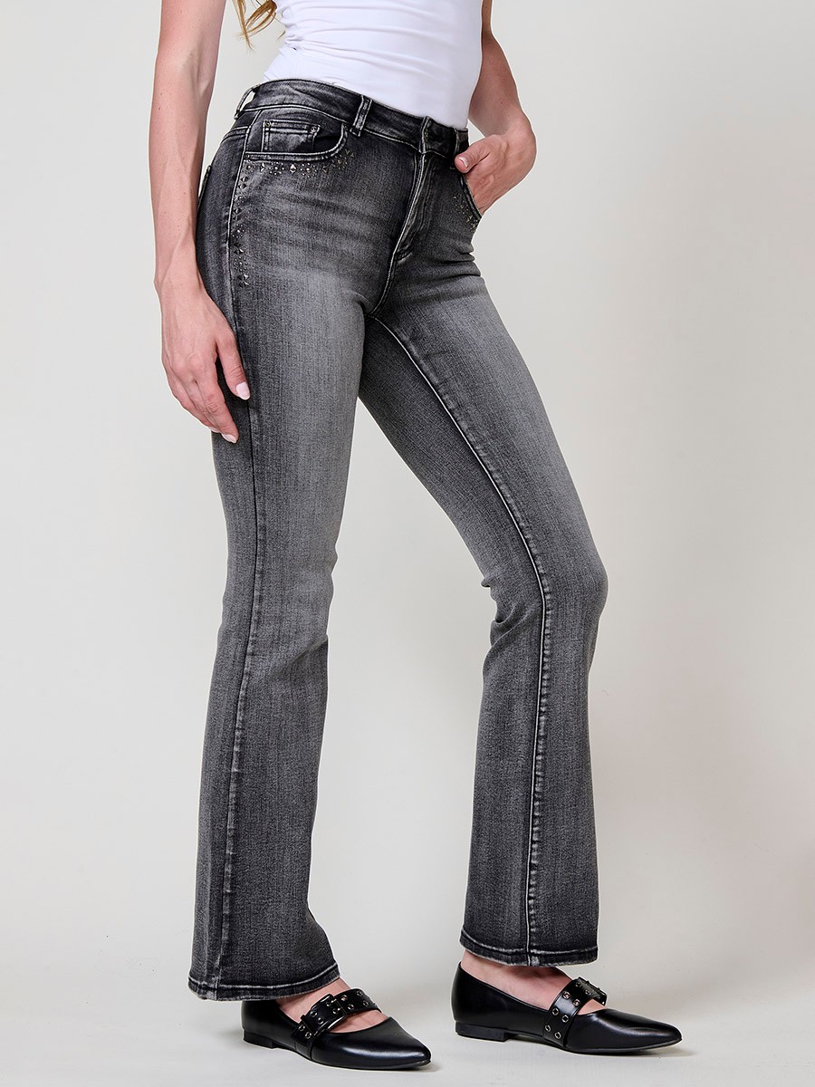Pantalons texans negres dona boot cut amb tacs metàl·lics de colors