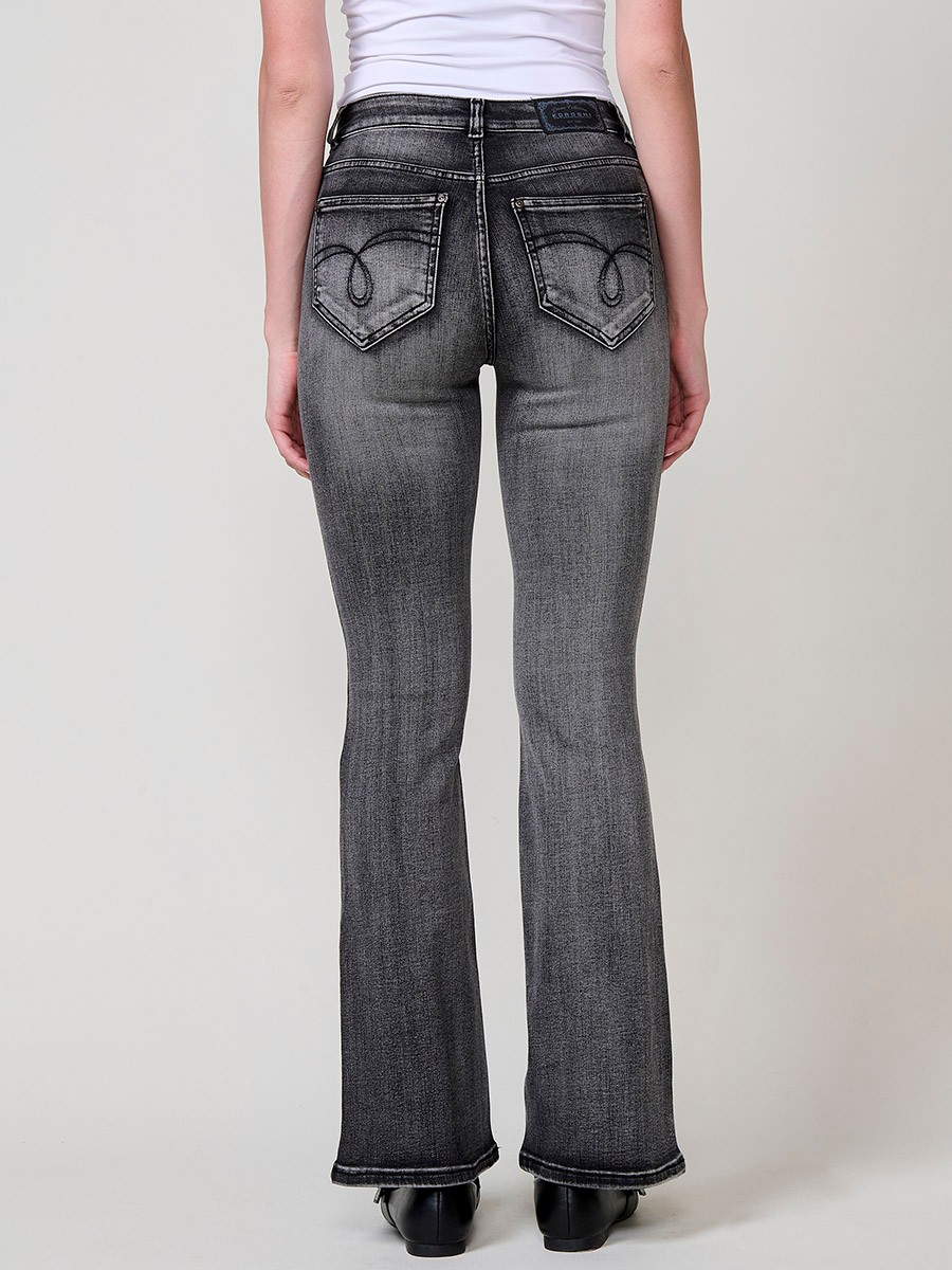 Pantalons texans negres dona boot cut amb tacs metàl·lics de colors