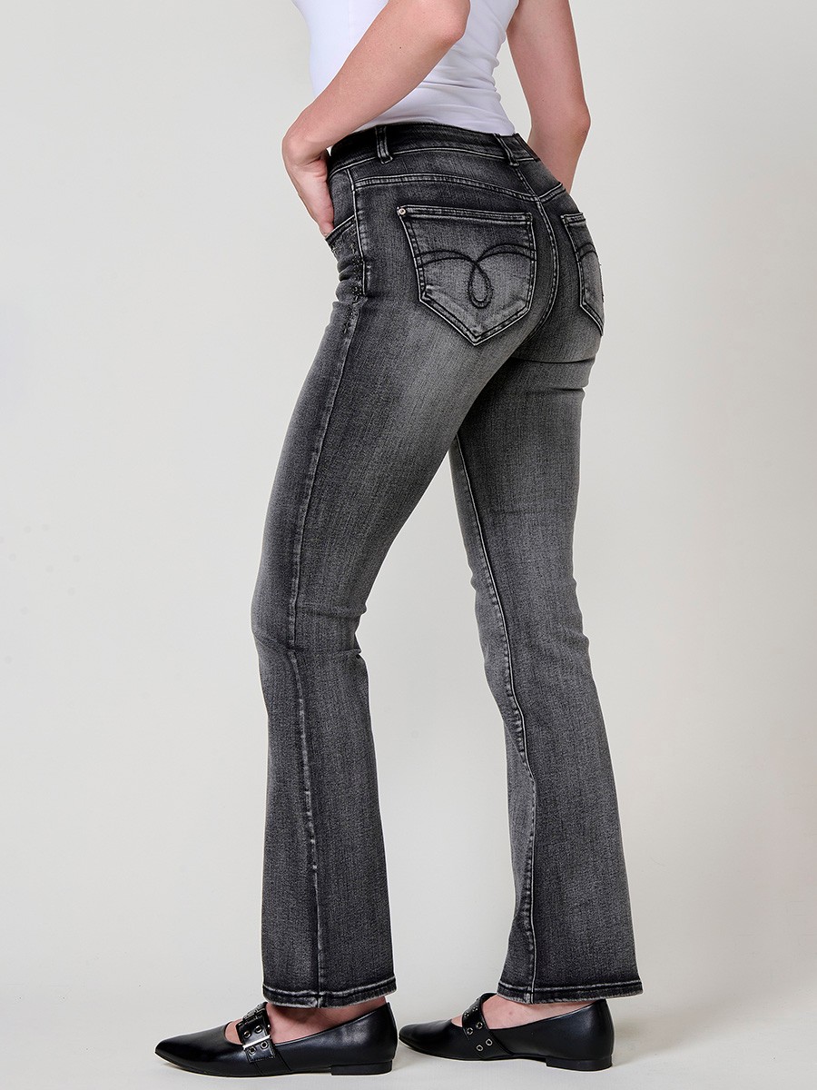 Pantalons texans negres dona boot cut amb tacs metàl·lics de colors