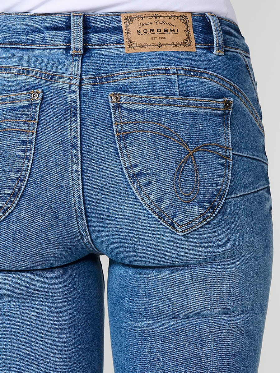Jean femme bleu foncé push-up coupe regular avec ourlet effiloché 8