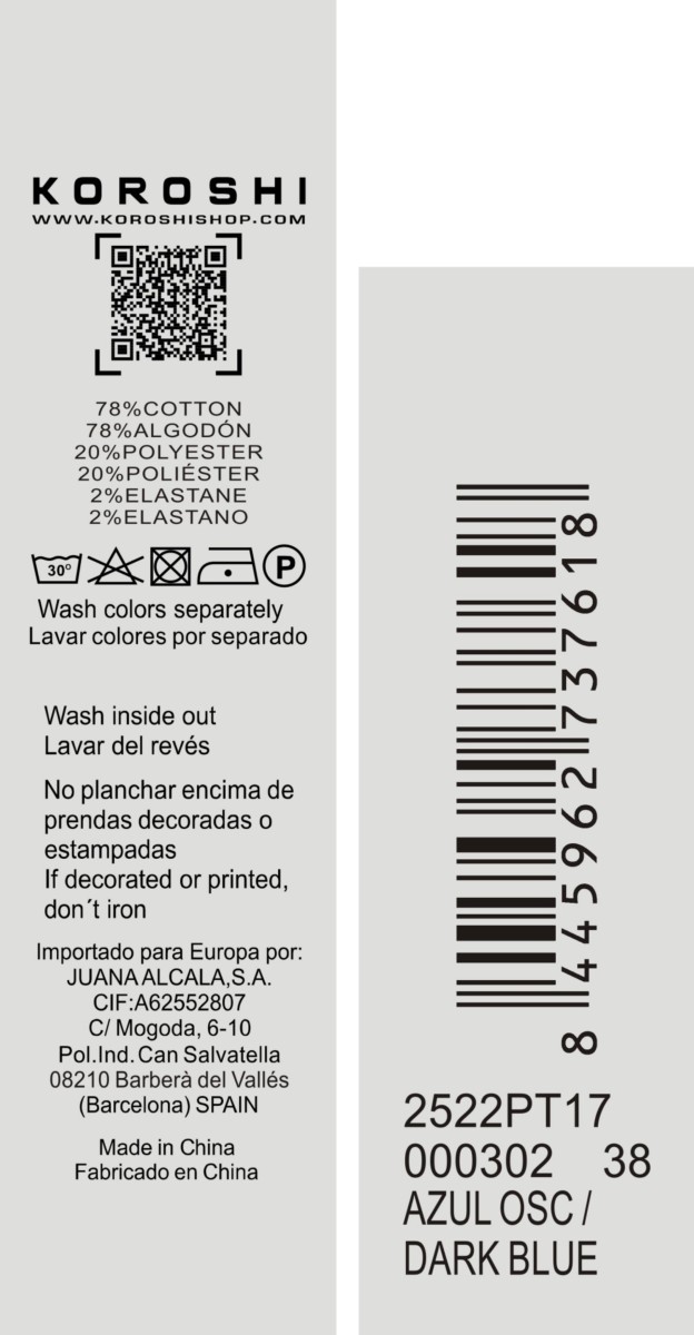 Jeans regular push up azul oscuro de mujer, tiro medio, cinco bolsillos, bordado con brillos y aberturas laterales en el bajo.
