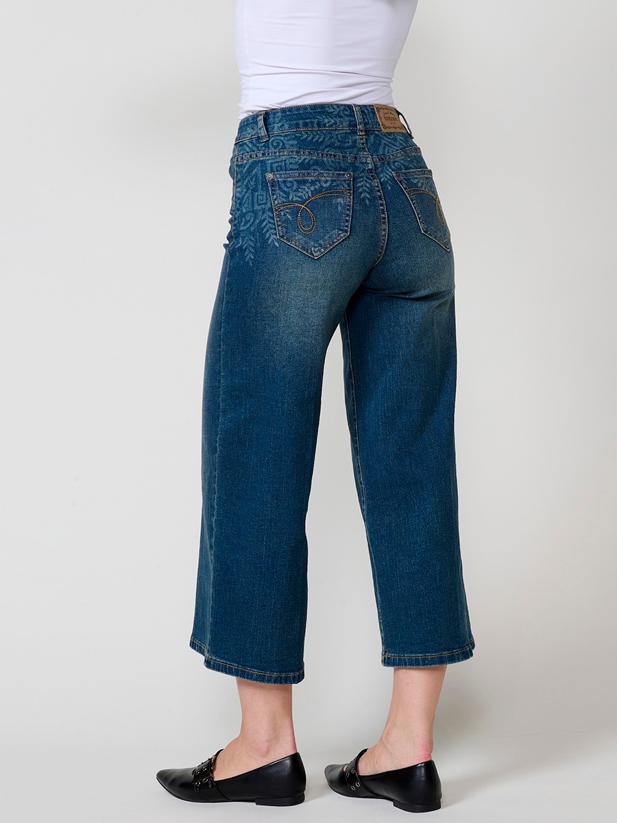 Damen-Culotte-Jeans in Dunkelblau aus Stretch-Denim, mittlere Leibhöhe, fünf Taschen, Metallverschluss und Bleach-Degradé.