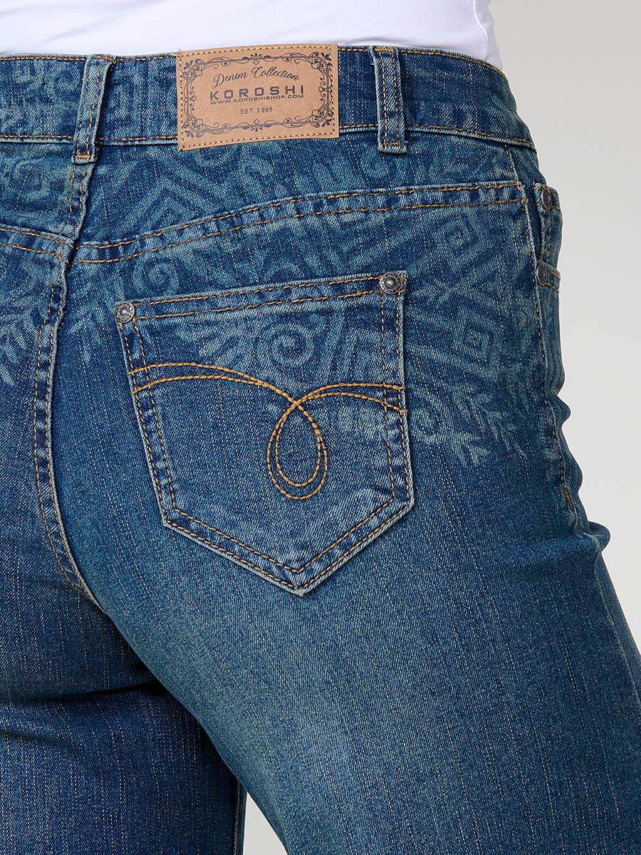 Damen-Culotte-Jeans in Dunkelblau aus Stretch-Denim, mittlere Leibhöhe, fünf Taschen, Metallverschluss und Bleach-Degradé.