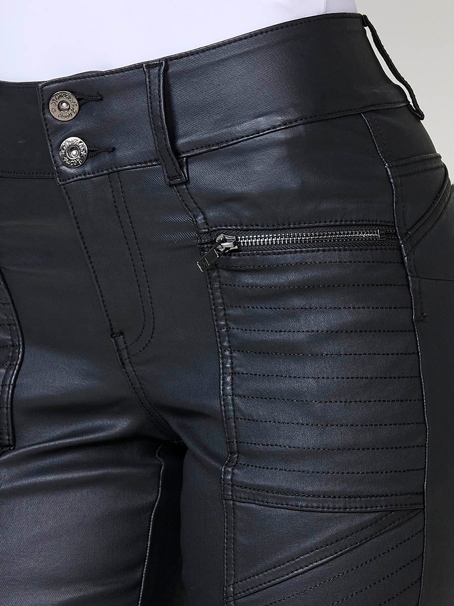 Women’s black coated biker-style slim push up pants with mid-rise, front zip pockets, double metal button closure and topstitch details.