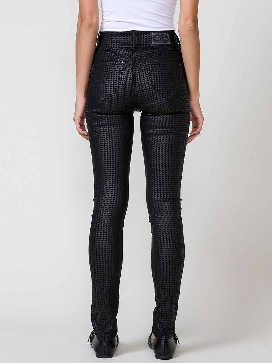 Women’s slim double push up pants with semi-shiny houndstooth print, mid-rise waist, five pockets and double button closure.