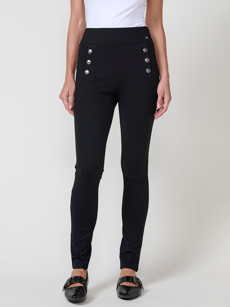 Leggings negros de mujer push up, tiro medio, cintura elástica y botones joya decorativos en el frontal.
