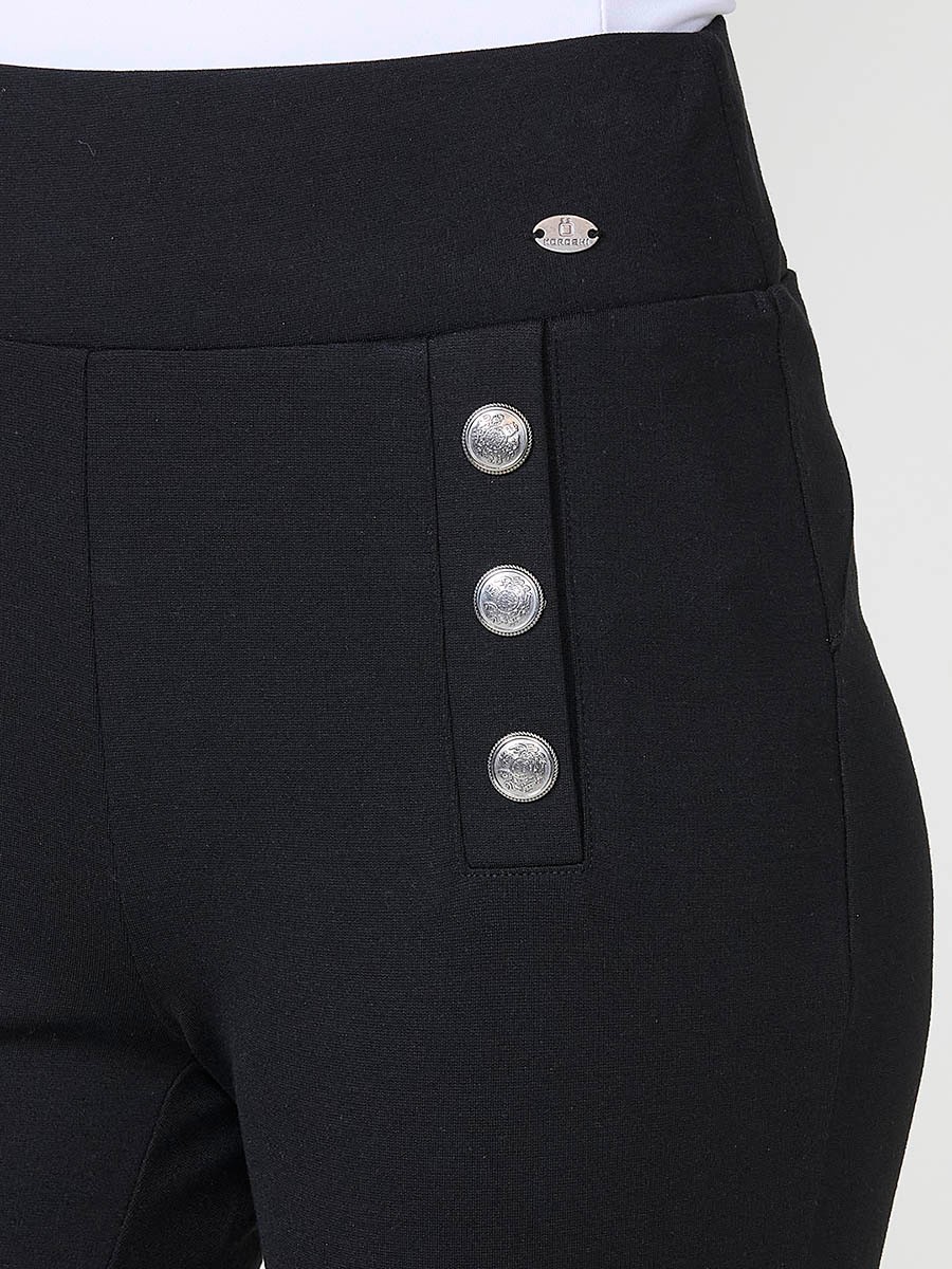 Leggings negros de mujer push up, tiro medio, cintura elástica y botones joya decorativos en el frontal.