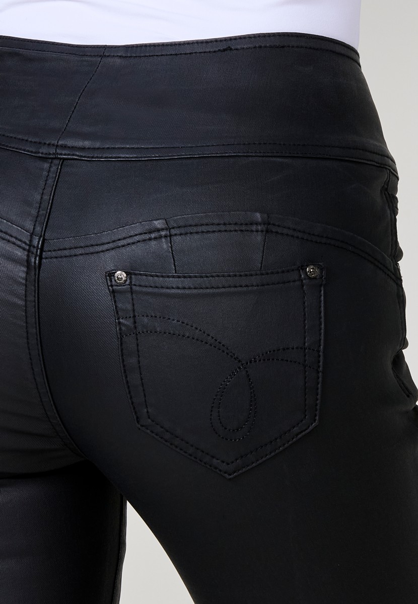 Women’s black high-waisted coated corset slim push up pants with five pockets, zip closure and three metallic buttons.