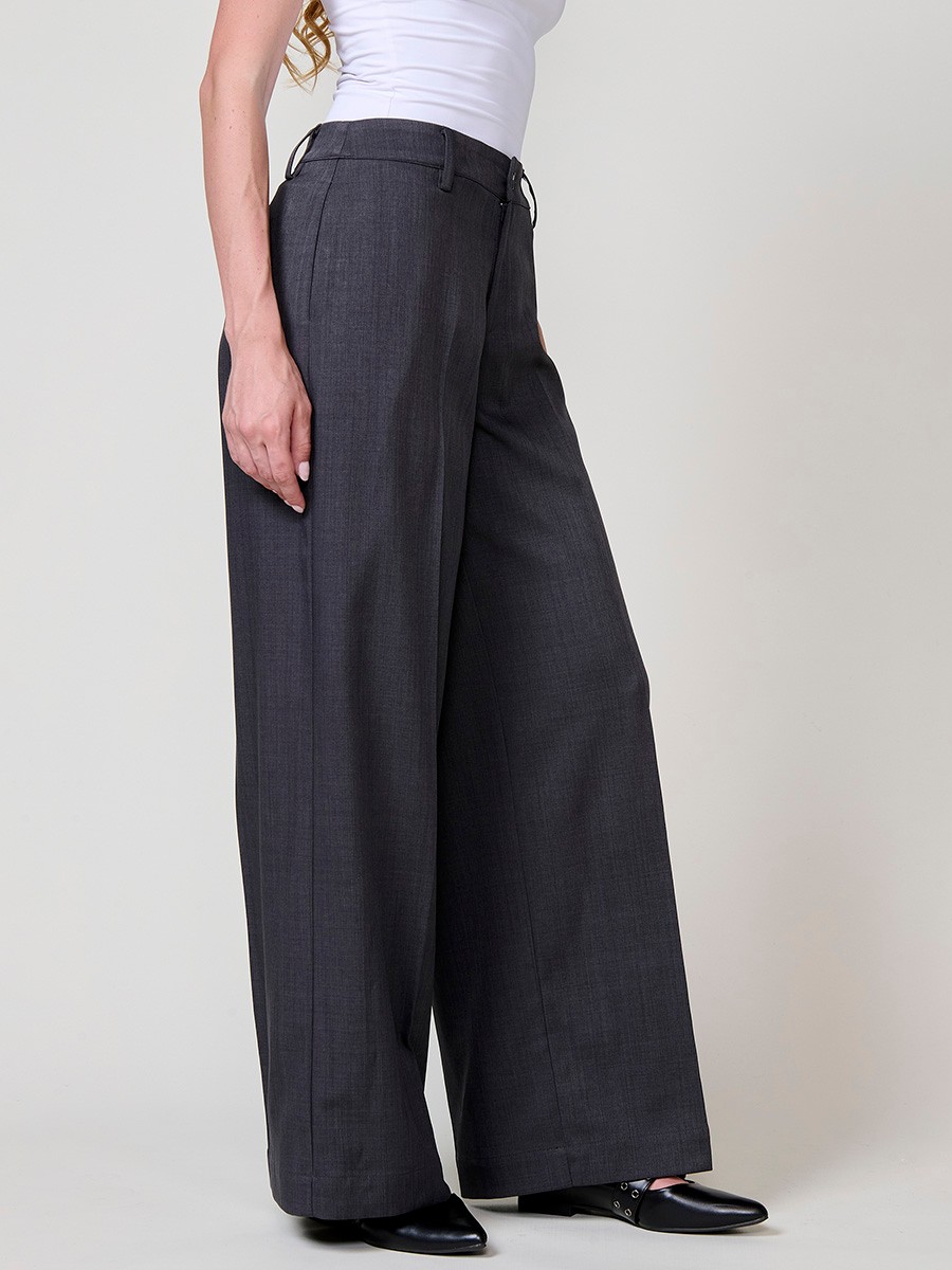 Women’s wide-leg high-rise pants with side pockets, belt loops, faux back welt pockets and Koröshi logo plate.