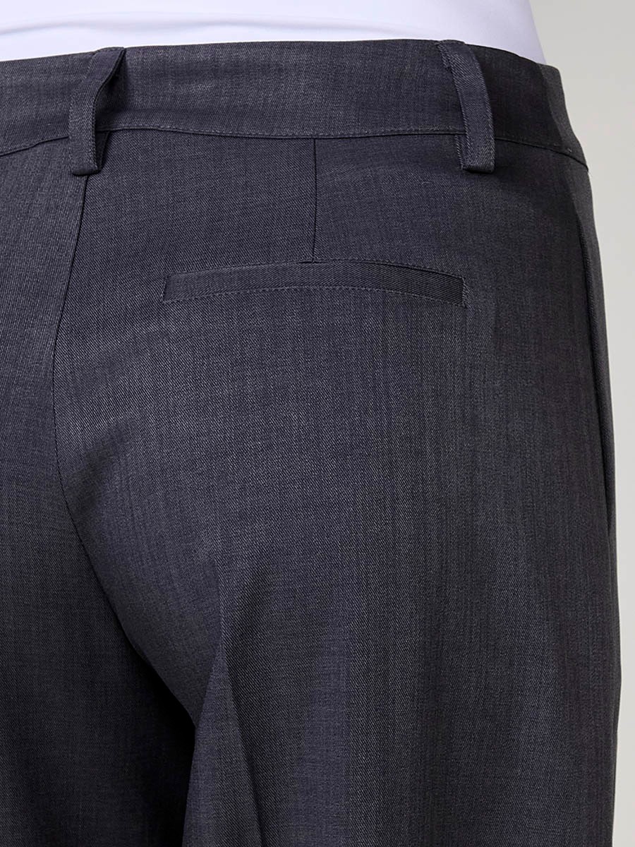Women’s wide-leg high-rise pants with side pockets, belt loops, faux back welt pockets and Koröshi logo plate.