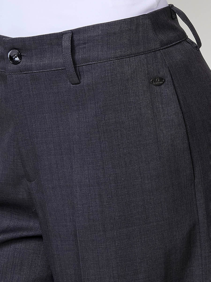Women’s wide-leg high-rise pants with side pockets, belt loops, faux back welt pockets and Koröshi logo plate.