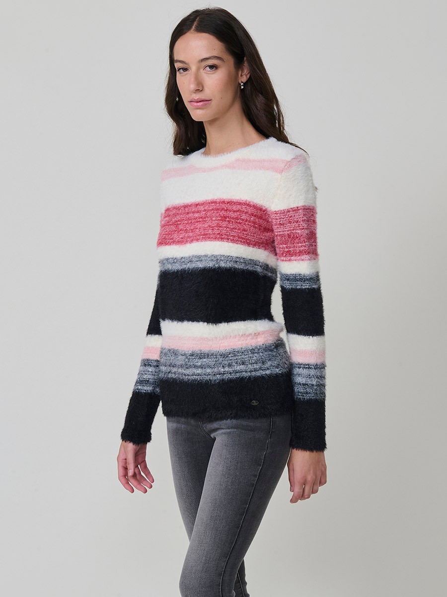 Jersey de punto con tacto pelo suave para mujer, escote redondo y manga larga. Listado de colores en armonía y placa metálica con logo Koröshi.