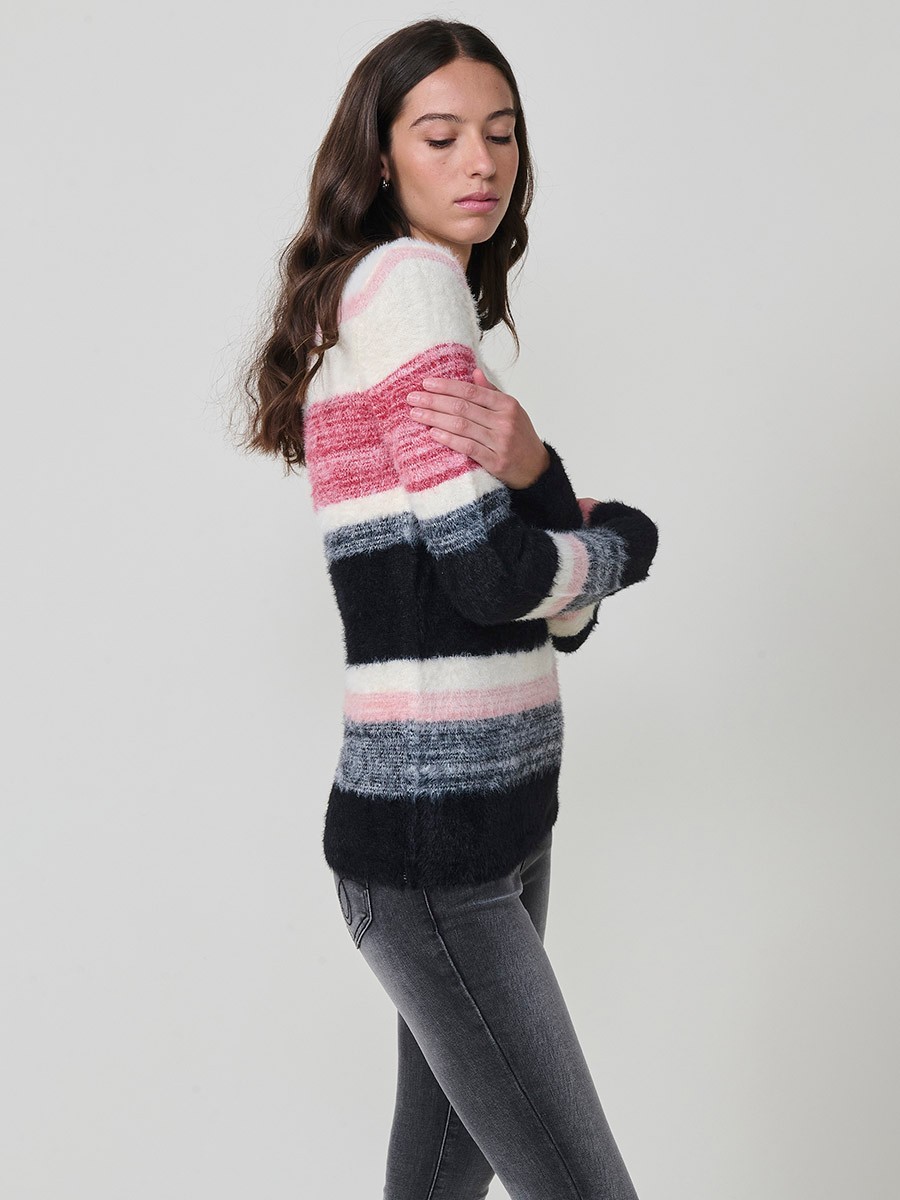 Jersey de punto con tacto pelo suave para mujer, escote redondo y manga larga. Listado de colores en armonía y placa metálica con logo Koröshi.