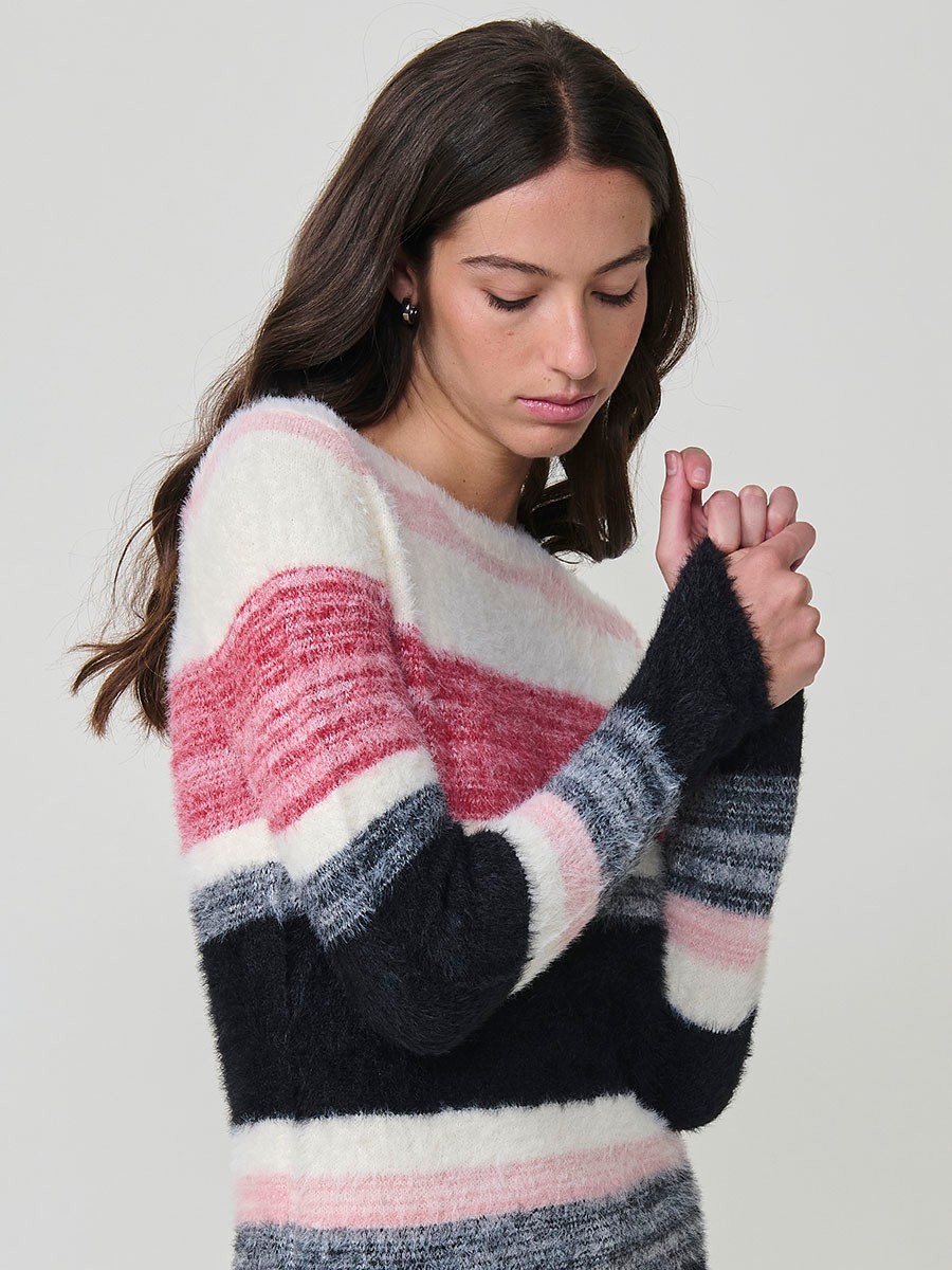 Jersey de punto con tacto pelo suave para mujer, escote redondo y manga larga. Listado de colores en armonía y placa metálica con logo Koröshi.
