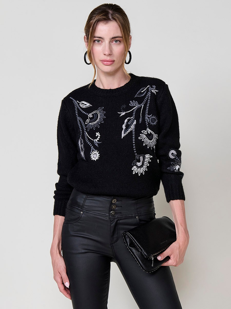 Women’s knit sweater with long sleeves, round neckline, floral embroidery on front and sleeve, Koröshi metal logo plate at hem.