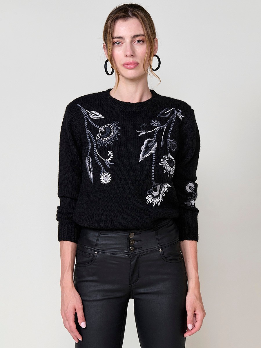 Women’s knit sweater with long sleeves, round neckline, floral embroidery on front and sleeve, Koröshi metal logo plate at hem.