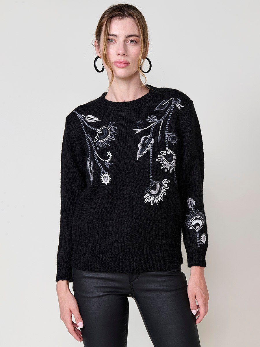 Women’s knit sweater with long sleeves, round neckline, floral embroidery on front and sleeve, Koröshi metal logo plate at hem.
