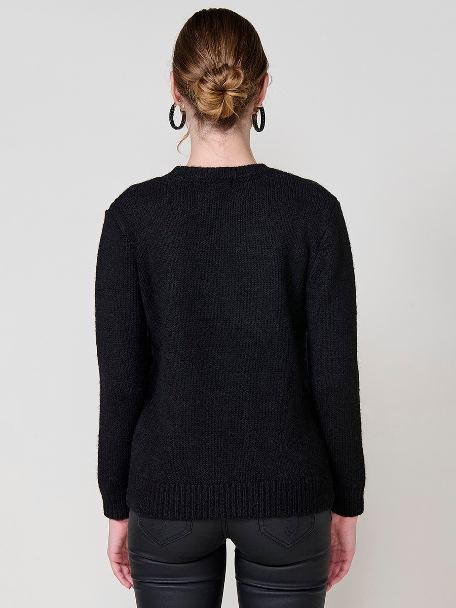 Women’s knit sweater with long sleeves, round neckline, floral embroidery on front and sleeve, Koröshi metal logo plate at hem.