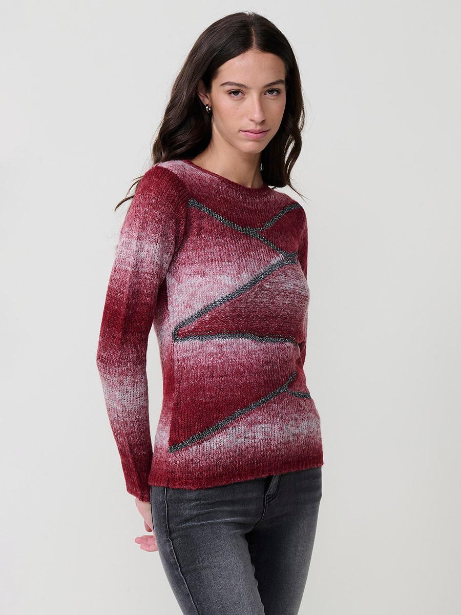 Jersey de punto para mujer con escote redondo, manga larga, detalles en hilo metalizado y lentejuelas. Placa metálica con logo Koröshi.