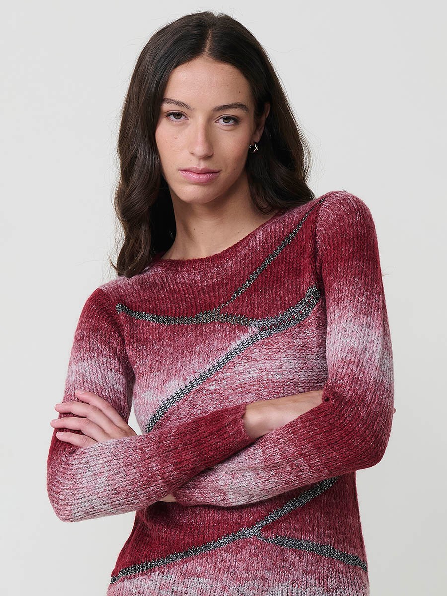 Jersey de punto para mujer con escote redondo, manga larga, detalles en hilo metalizado y lentejuelas. Placa metálica con logo Koröshi.