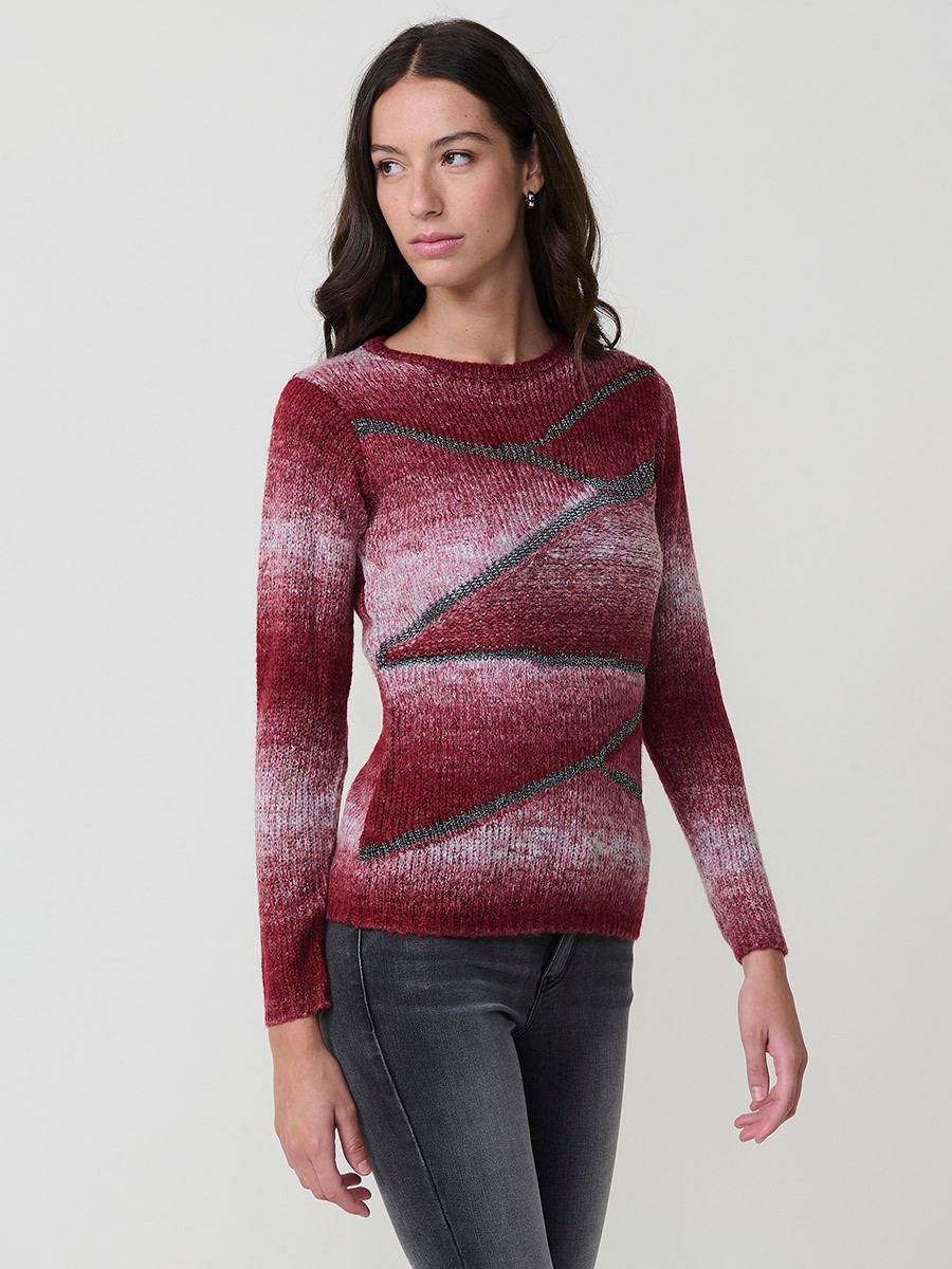 Jersey de punto para mujer con escote redondo, manga larga, detalles en hilo metalizado y lentejuelas. Placa metálica con logo Koröshi.