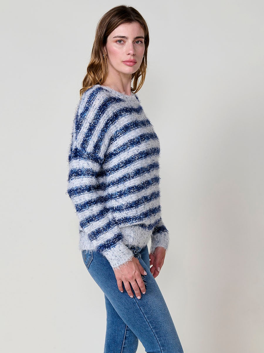 Women’s knit sweater with soft-touch furry texture, round neck, long sleeves, multicolor striped design and Koröshi logo plate.