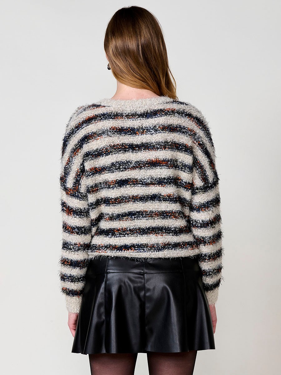 Women’s knit sweater with soft-touch furry texture in ivory, round neck, long sleeves and Koröshi logo plate.