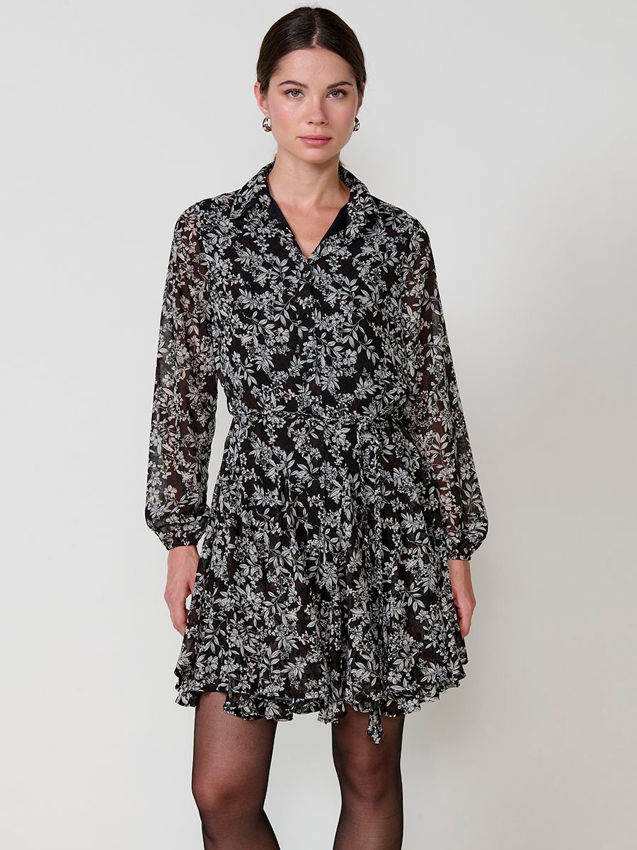 Women’s short floral chiffon shirt dress with shiny details, long sleeves and godet cut.