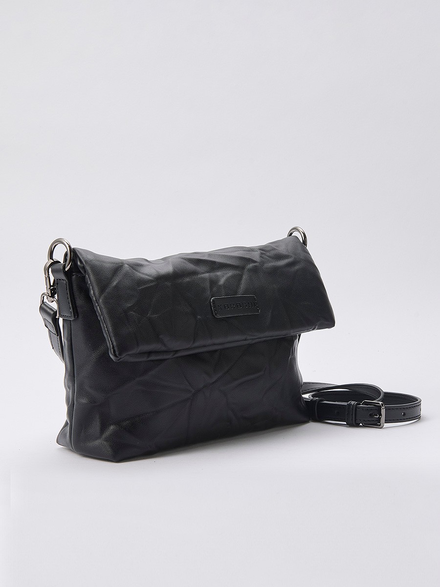 Women’s crossbody bag with wrinkled leather-effect texture, top zip closure and inner pocket.