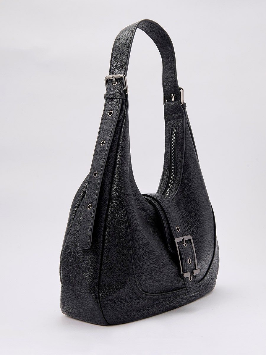 Faux leather women’s shoulder bag with top zipper closure, metal buckle detail and inner pocket.